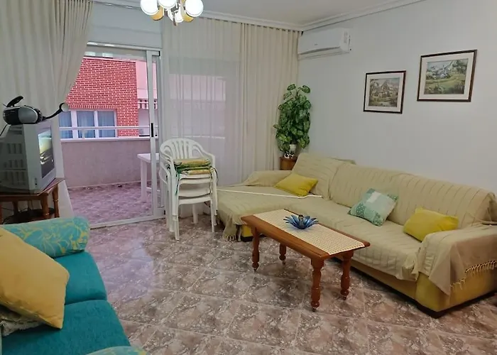 Al Ladito De La Playa